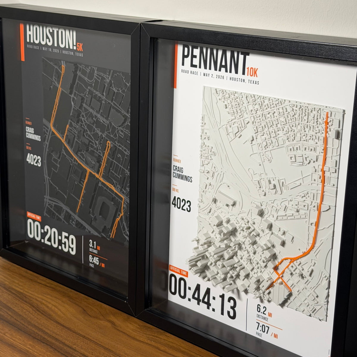Nocturne Houston 5K and Gallery Pennant 10K Trace samples displayed side by side in black frames.