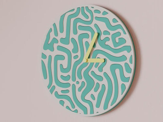 Dapple Wall Clock shown in a styled interior as graphic wall decor.