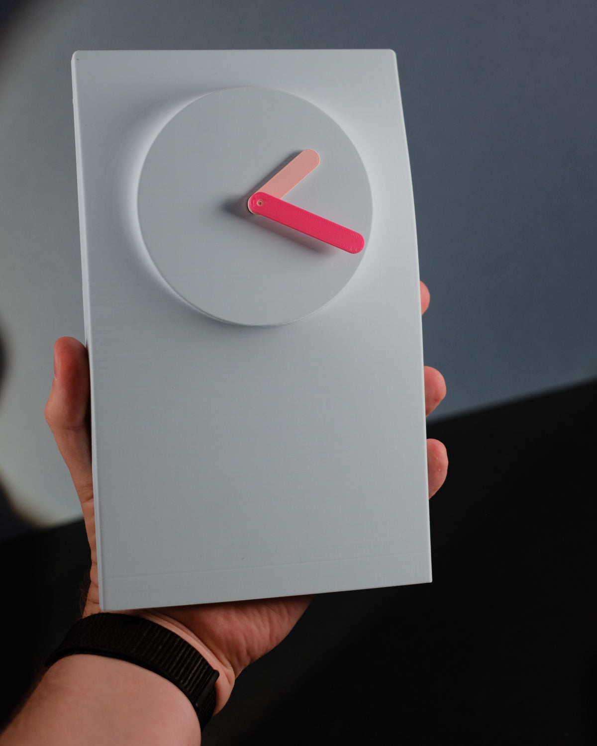 Simplify Wall Clock shown from an angled view to highlight its depth and profile.