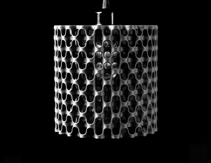 Chain Pendant Light shown from an angle to highlight the 3D-printed shade pattern.