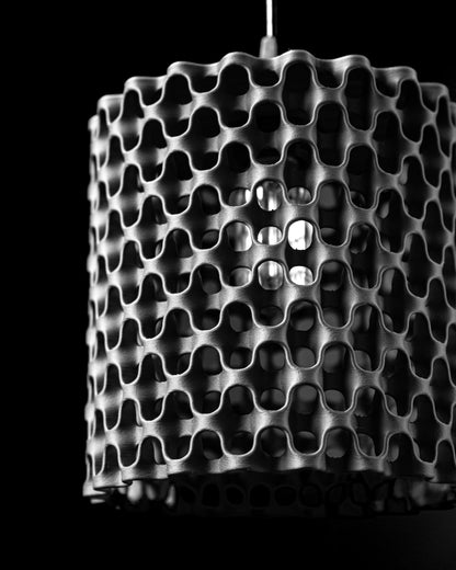 Chain Pendant Light styled as ambient lighting above a contemporary space.