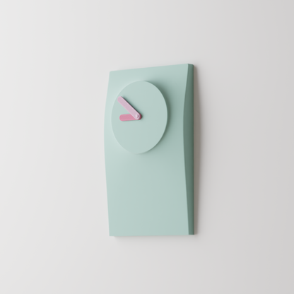 Simplify Wall Clock in a clean modern colorway, shown as a sculptural wall object.
